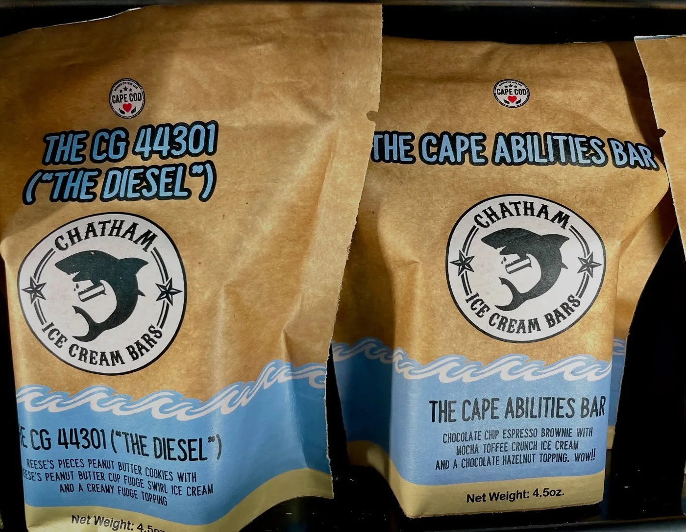 Pouches of The CG 44301 (“The Diesel”) and The Cape Abilities Bar side by side in a freezer